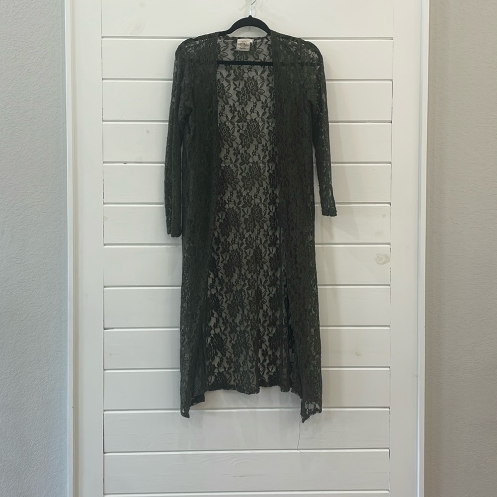Brand New Condition Cardigan. Smoke free, pet free home.